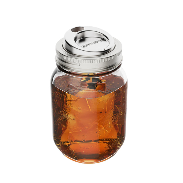 Jarware Stainless Steel Sip Lid on a regular mouth Mason jar. The lid all stainless steel.