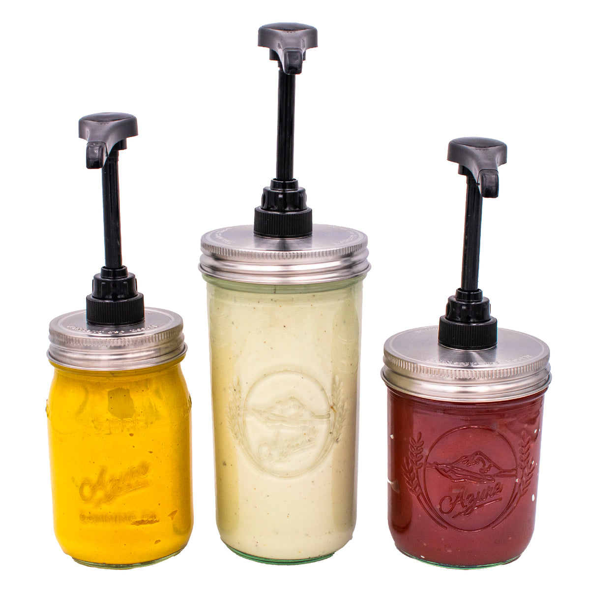3 Mason jars, each with a black plastic food grade pump and stainless steel lid, containing mustard, ranch, and ketchup.