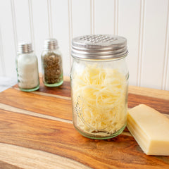 Grater shredder lid cheese parmesan kitchen regular mouth salt pepper staged