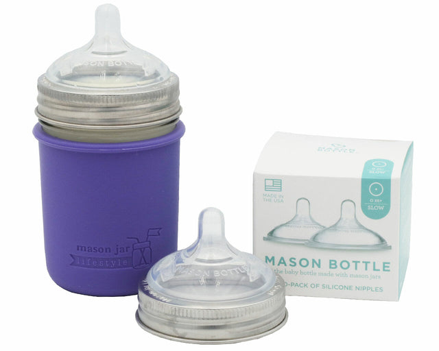 Two Mason Bottle silicone nipples with stainless steel bands, one shown on a jar with a purple sleeve; jar and sleeve not included