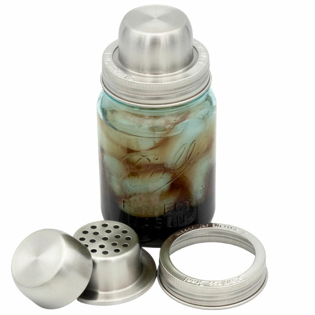 Mason jar stainless steel cocktail shaker lid on a regular mouth 16oz pint Mason jar.