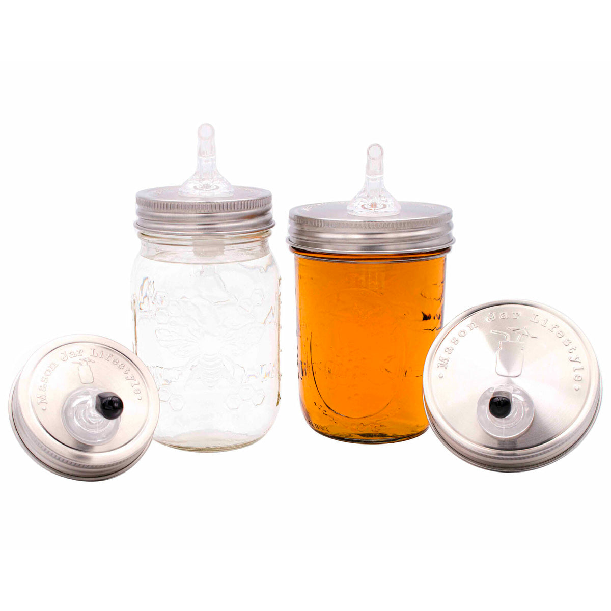 Regular Mouth and Wide Mouth stainless steel liquor pour spout lids with clear plastic spouts, shown on Mason jars and with black caps.